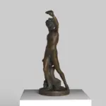 Busto de Baco adornado con hojas de vino y hiedra.
