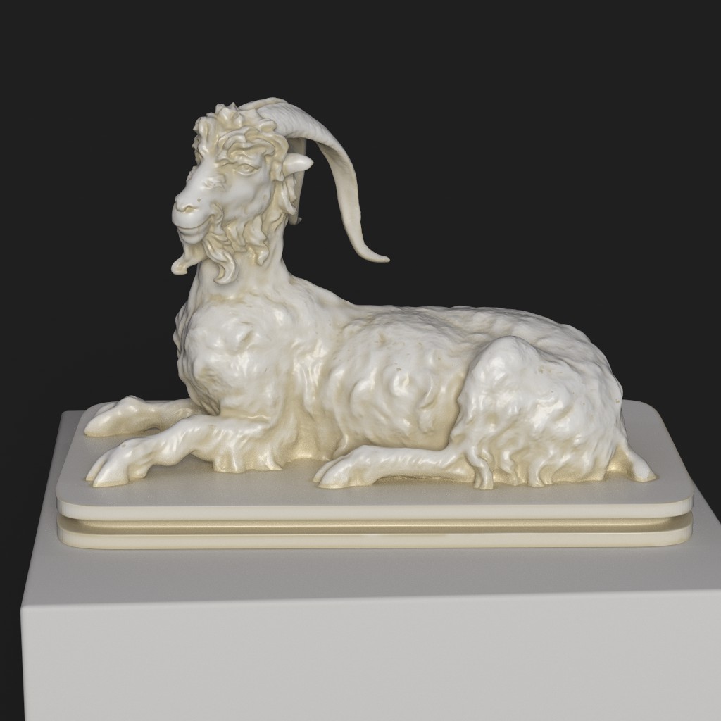 Escultura de la Cabra Descansando con detalles anatómicos y acabado en pátina.