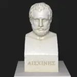 Busto de Aischines en resina con efecto de mármol y bronce.