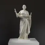 Escultura de Adorante restaurado como Euterpe en El Louvre de París