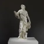 Escultura de la Alegoría de la Lealtad con un hombre y un perro.