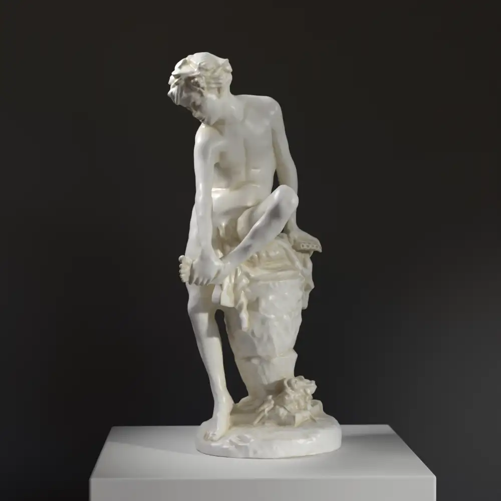Escultura del Niño quitándose una espina en resina con acabado de pátina.