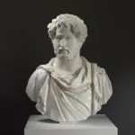 Busto de un hombre anciano en resina con pátina que imita mármol y bronce.