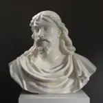 Busto de Cristo en resina con acabado de pátina.