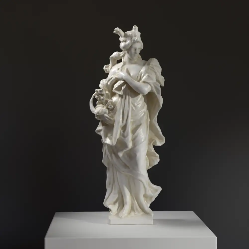 Escultura de Ceres en resina con efecto de mármol y bronce.