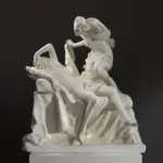 Escultura de Cupido y Psique en resina con acabado en mármol y bronce.