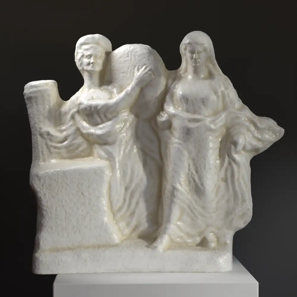Escultura de Mujeres Bailando que muestra a dos figuras en movimiento.