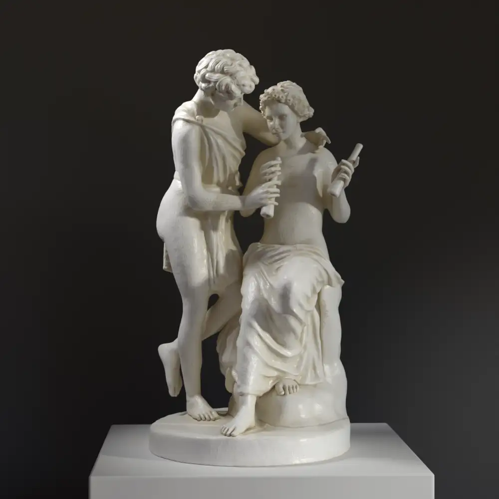 Escultura de Daphnis y Chloe en El Louvre de París, mostrando a Daphnis serenando a Chloe.