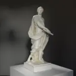 Escultura de Julio César con pátina de mármol y bronce.
