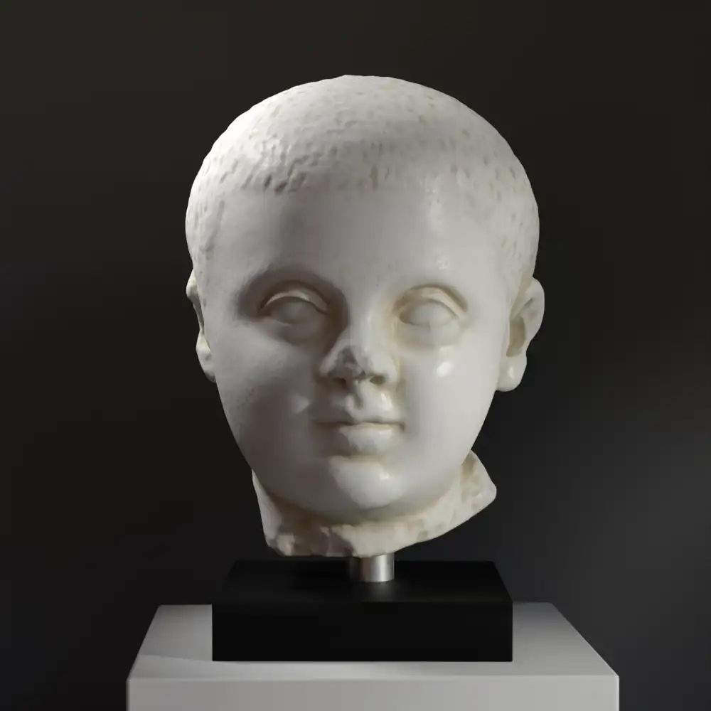 Busto de un niño en resina con acabado de mármol.