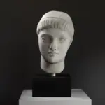 Busto de un Hombre en resina con pátina de mármol y bronce.