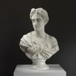 Busto del Emperador Tiberio en resina con efecto de mármol y bronce.