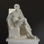 Sculpture du Nu Masculin Assis en résine avec patine imitant le marbre.