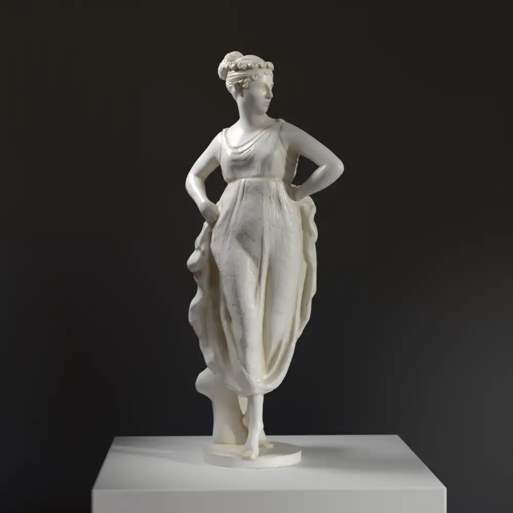 Sculpture de Danseuse en résine, représentant une femme gracieuse.