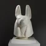 Couvercle de jarre canopique représentant les Quatre Fils d'Horus.