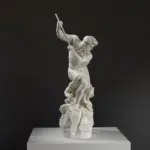 Sculpture de Neptune combattant un poulpe en résine avec patine.