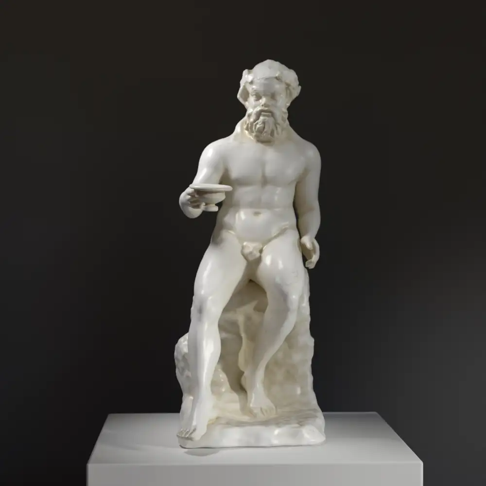 Sculpture de Papposilenus en résine, avec une patine imitant le marbre.