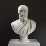 Buste de Michel-Ange en résine avec effet de patine marbrée et bronze.