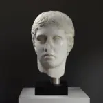 Buste de la Tête d'Hercule avec finition en patine marbrée et bronze.