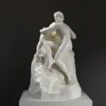 Replica della Scultura di Adolfo Apolloni con figura femminile nuda su blocco di marmo.