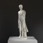 Replica della scultura del cosiddetto Bacco-Ermafrodito in resina con patina.