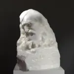 Busto del Pensatore in resina con finitura in marmo e bronzo.