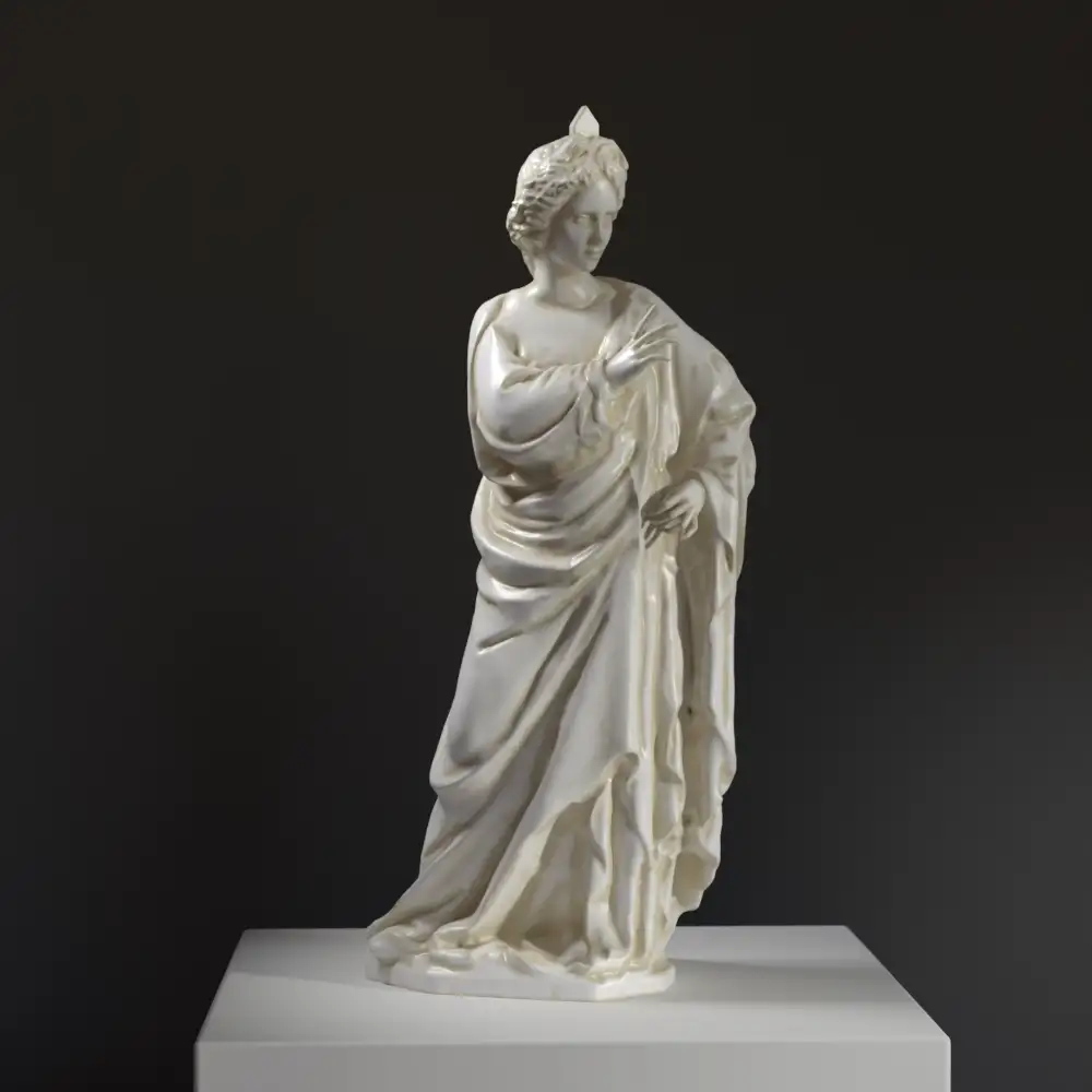 Scultura dell'Arcangelo Gabriele dell'Annunciazione in resina con effetto patinato.
