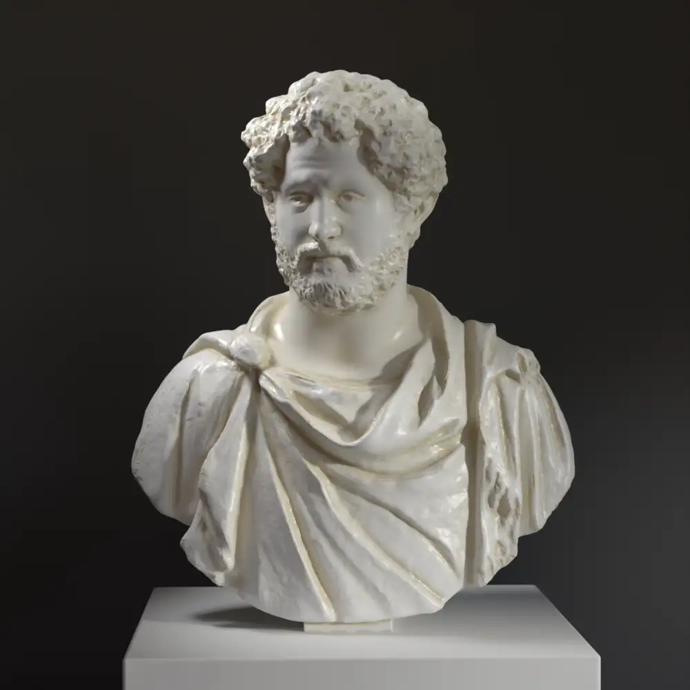 Busto di un uomo anziano in resina con patina che imita marmo e bronzo.