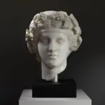 Busto di Dionisio in resina con finitura marmorea.