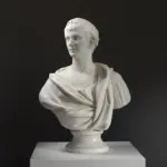 Busto dell'Imperatore Traiano in resina con effetto marmo e bronzo.